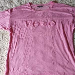 Light pink bebe workout top mesh back